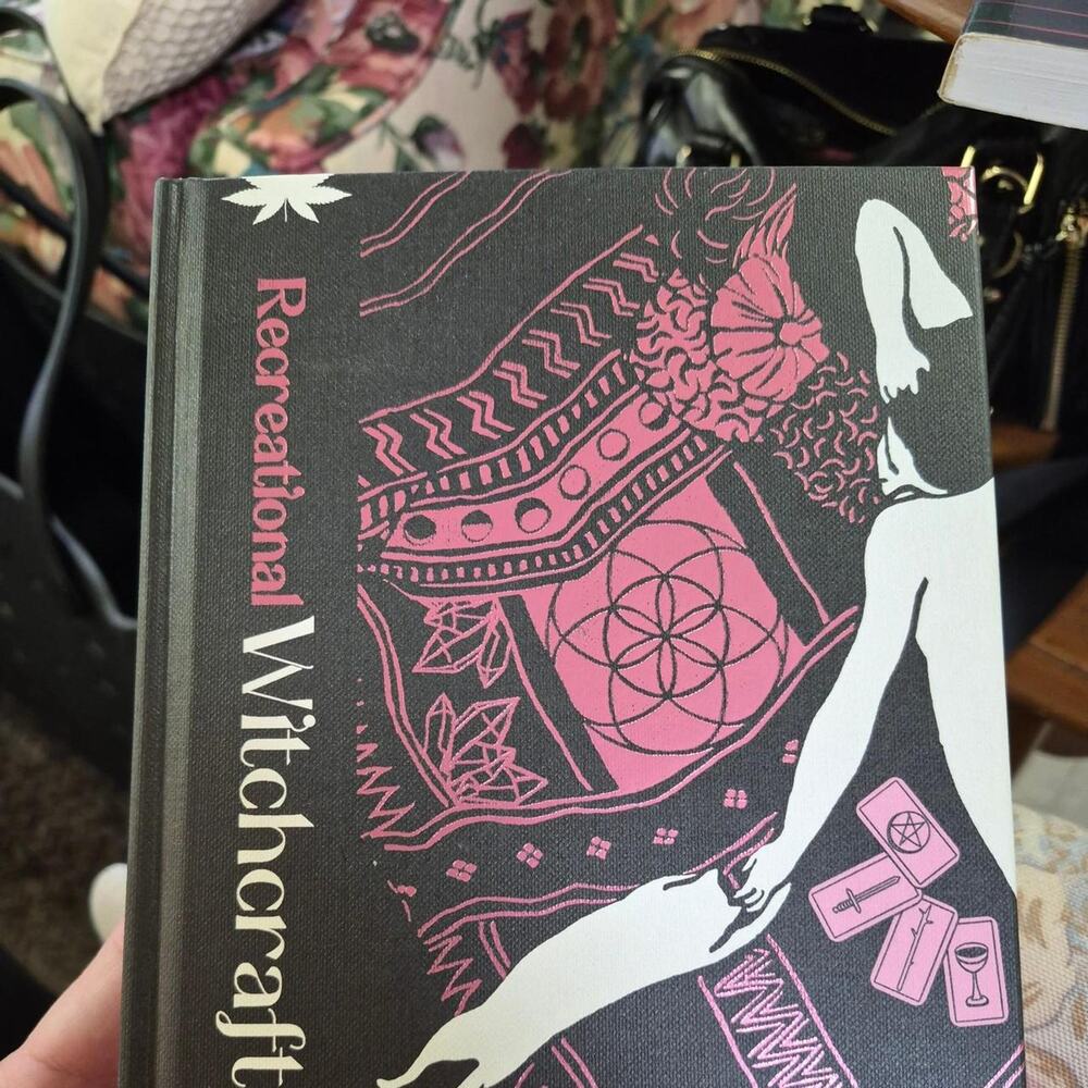 Recreational witchcraft book with pink